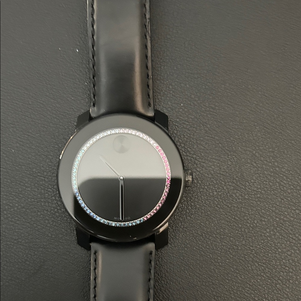 Movado Black Minimalist Dial Watch with Rainbow Crystal Accent